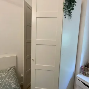 Modern White Wardrobe with Hanging Rail and Adjustable Shelves - Image 8