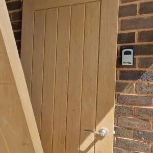 Two solid wood internal doors with brushed chrome handles