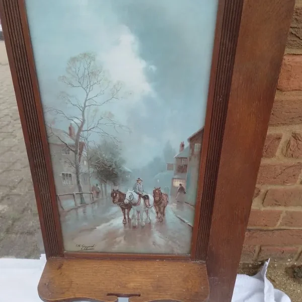 J.W. Gozzard prints set in overmantel