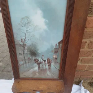 J.W. Gozzard prints set in overmantel