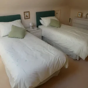 Two single beds with everything you need