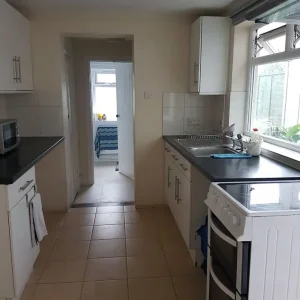 Large double bedroom in Coronation Avenue house, Chigwell - Image 3