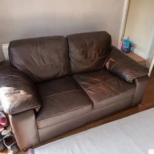 Two seater faux leather sofa