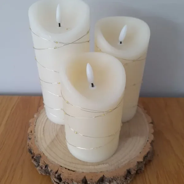 3 cream gold battery candles wood log stand