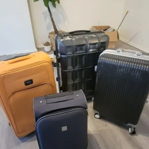 4 suitcases, various sizes