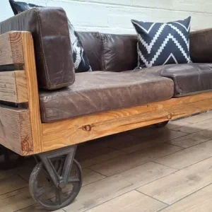 Timothy Oulton Industrial style 2 seater leather sofa with wooden frame