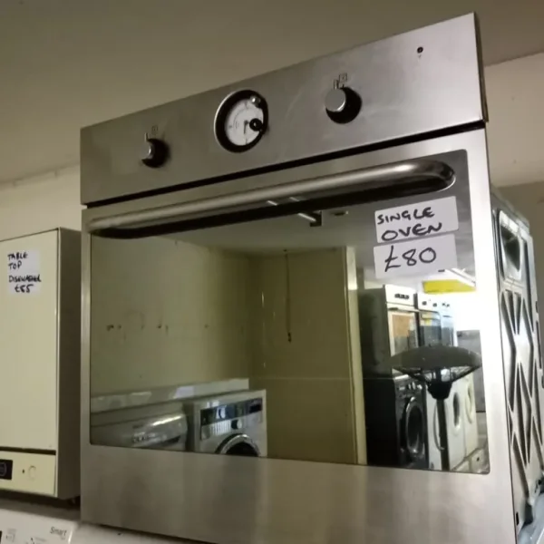 Integrated single fan assisted oven