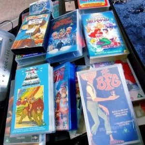 Retro TV and a stack of VHS tapes - Image 2