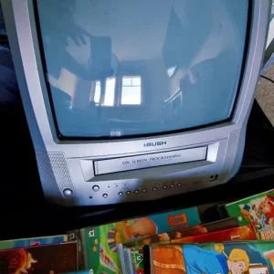 Retro TV and a stack of VHS tapes - Image 3