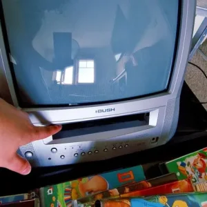 Retro TV and a stack of VHS tapes - Image 4