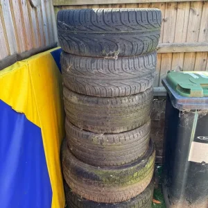 6 old car tyres