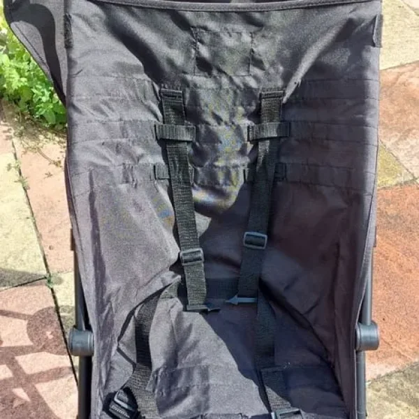 Black stroller with sun canopy