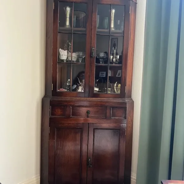 Dark wood corner cabinet