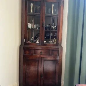 Dark wood corner cabinet