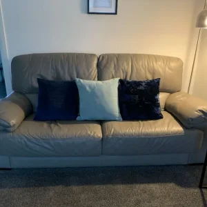 Three piece suite and footstool
