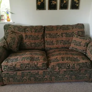 3 seater sofa with green elephant pattern