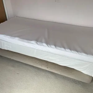 Single bed with topper