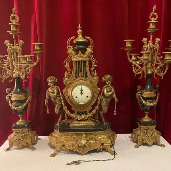 Clock and matching candelabras