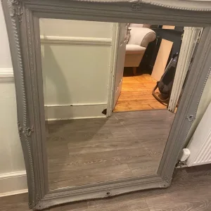 Ornate wooden framed mirror