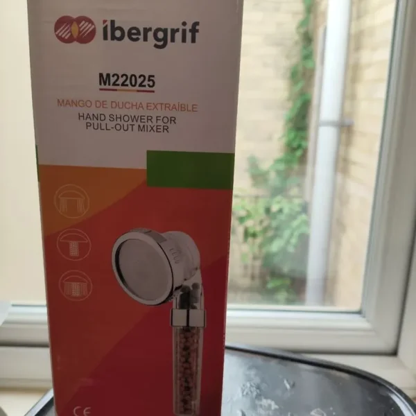 Shower head with filter and beads