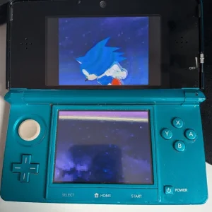 Nintendo 3DS with games, case, charger - Image 3