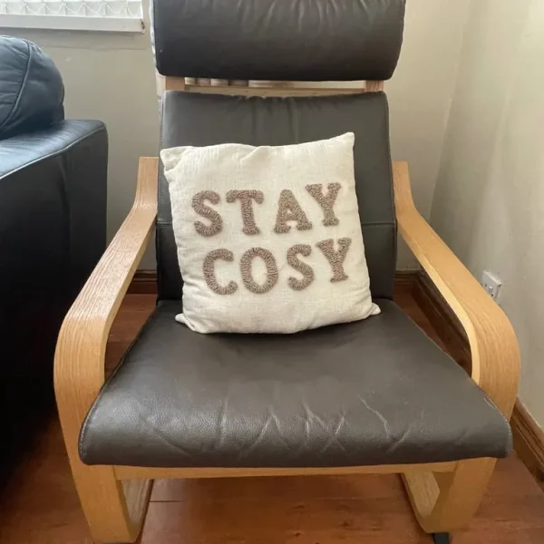 Brown leather style armchair