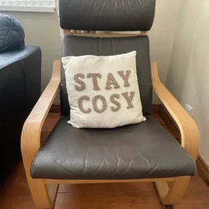 Brown leather style armchair