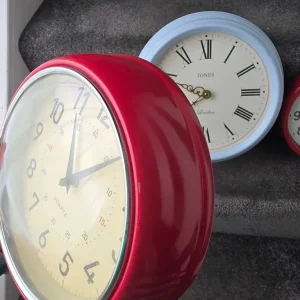 Quartz red wall clock with small mark and dent - Image 2