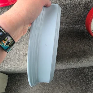 Quartz red wall clock with small mark and dent - Image 4