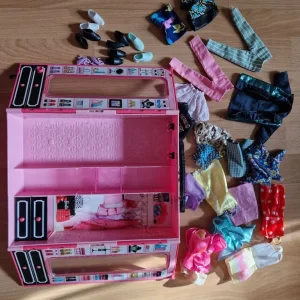 Barbie wardrobe with clothes and shoes