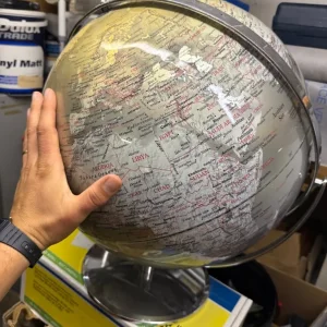 Silver globe with relief