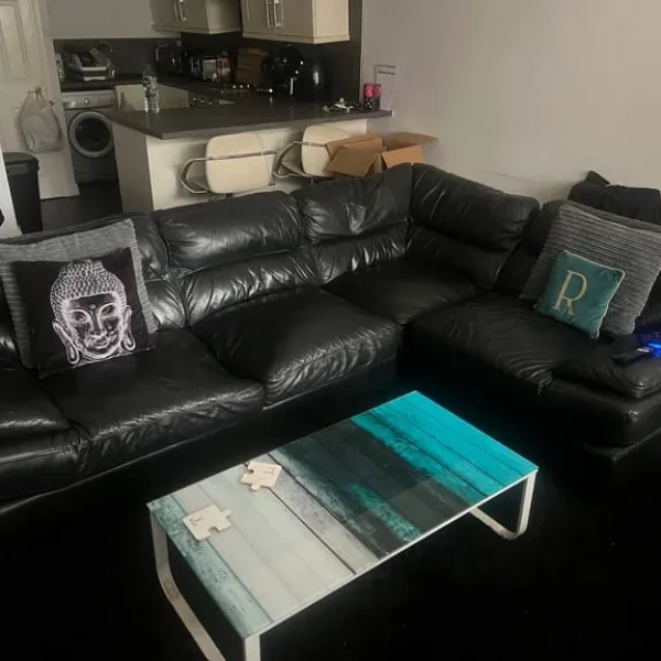 Black leather corner sofa