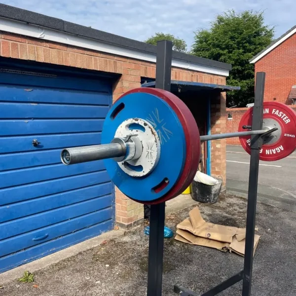 Squat Stand with Olympic barbell and bumper plates