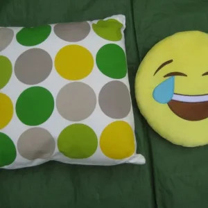 Large Ben de Lisi Cushion and Round Smiley Face Cushion
