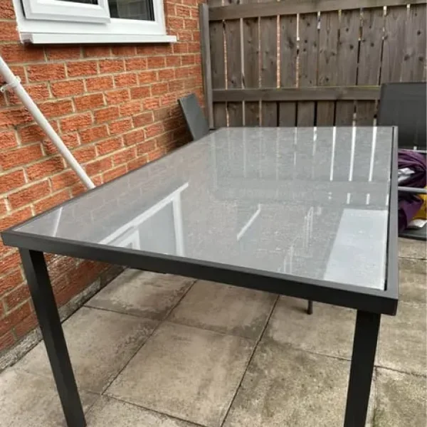 Outdoor metal and glass dining table with 3 chairs