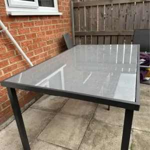 Outdoor metal and glass dining table with 3 chairs