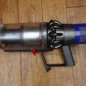 11 Dyson handheld vacuums and a Vax for parts