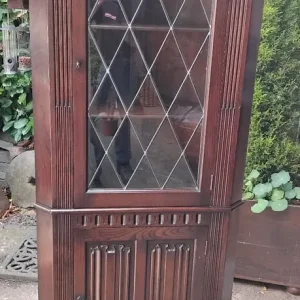 Solid Oak Corner Cabinet with Leaded Glass and Linenfold Door