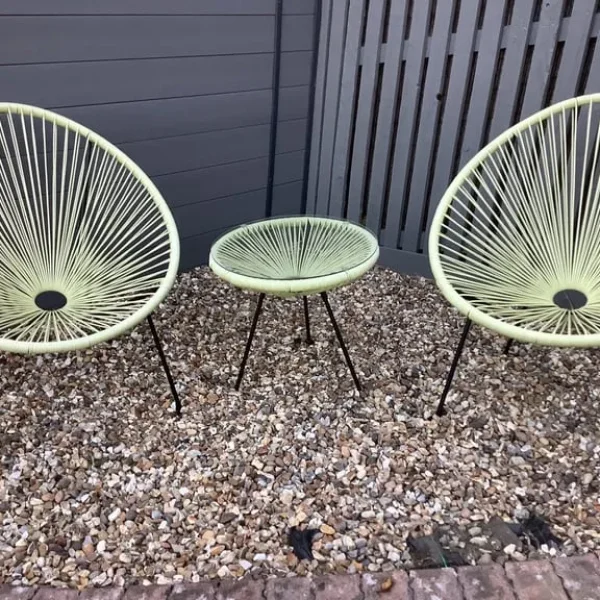 Rattan Egg String Chairs and Clear Glass Table