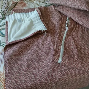 Lined curtains and matching cushions