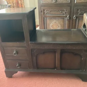 Dark wood lion carved telephone table