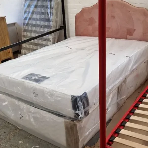 Double 4ft6ins divan bed set with white base, pink headboard and firm mattress