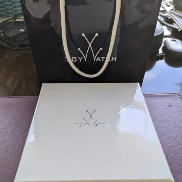 ToyWatch Womens rose gold and clear plastic wristwatch