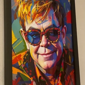 Elton John photos in A4 box frames