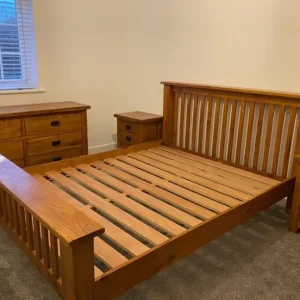 Rustic solid oak king size bed frame with bedside cabinets and dresser
