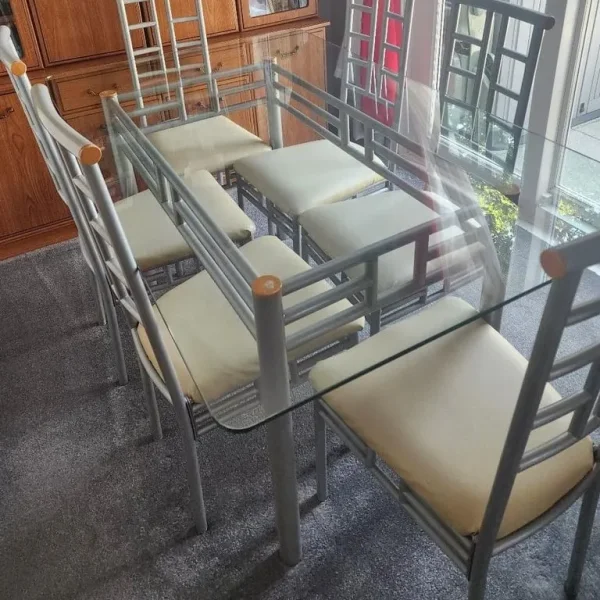 Matching dining table and six leather chairs