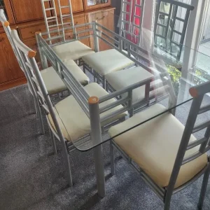 Matching dining table and six leather chairs