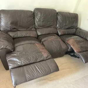 Cosy three-seater leather recliner sofa
