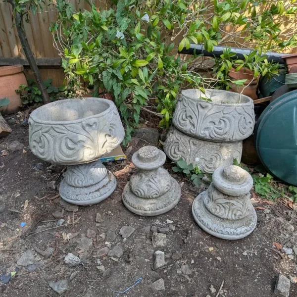 Concrete garden pots with stands