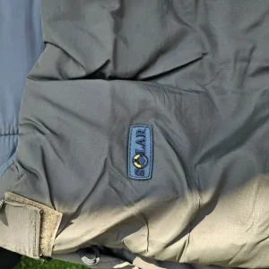 Carp fishing setup with rods, barrow, and gear - Image 5